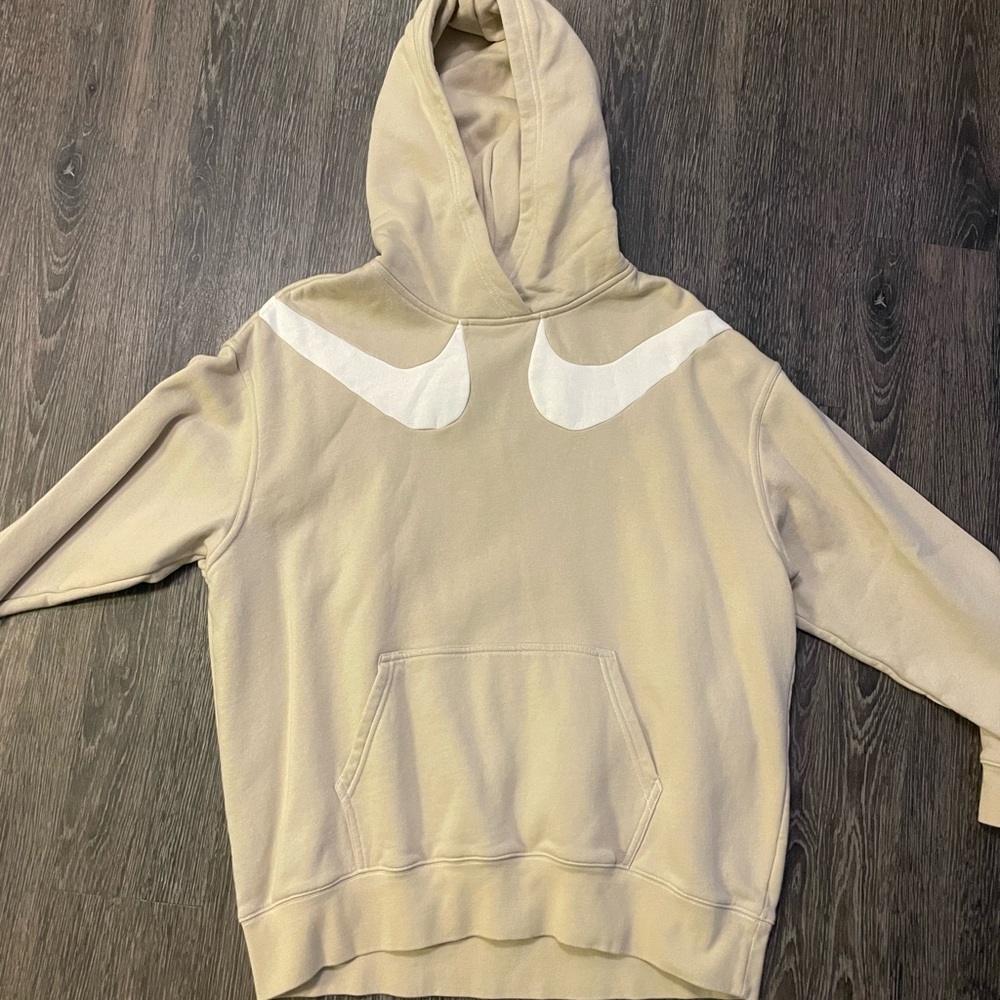Tan and white Nike sweatshirt. Size Medium